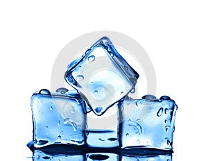 Three ice cubes on white background