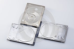 Three 2.5-inch mechanical hard drives close-up