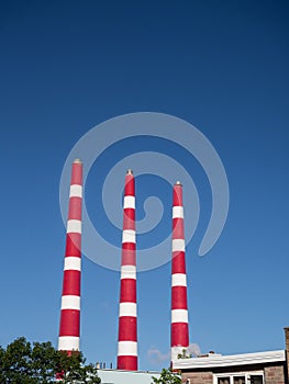 Three industrial chimneys