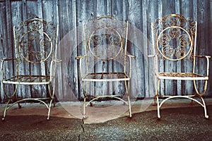 Three iron chairs