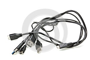 Three Isolated Black Intertwined USB Cables on White