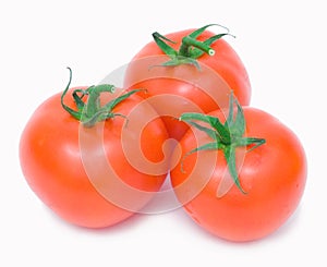 Three isolated tomatoes