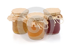 Three jars of homemade jam photo