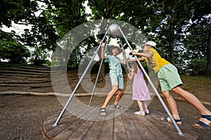 Three kids rides on the playground. Centrifuge, swing for children