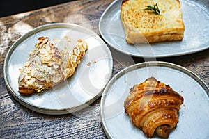 Three kind of bread on plates