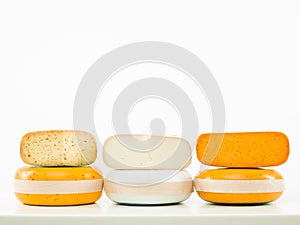 Three kinds of cheese arranged in line