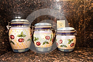 Three Kitchen Canisters With Latches