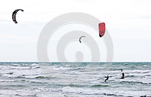 Three Kite Surfers