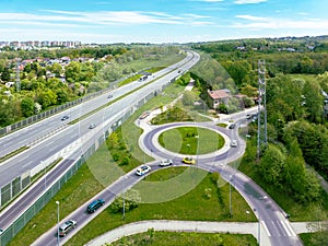Three lane highway and traffic circle in Krakow, Poland