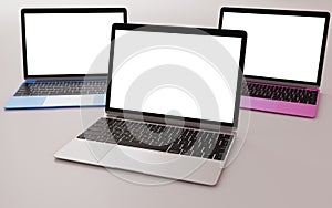 Three laptops with different colors and flat white screen. photo