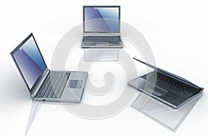Three laptops over white background