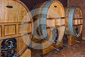 Three large wine vats with spigot