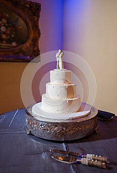 Three layer white wedding cake