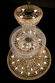 Large luxury chandelier in black background