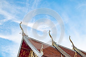 Three layers roof of a buddhist church in Thai temple