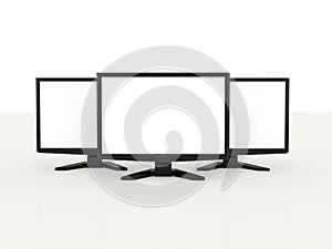 Three LCD monitors with white screen