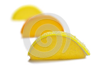 Three lemon jelly segments isolated