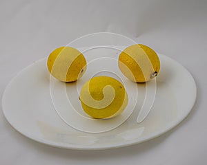 Three Lemons on a Plate