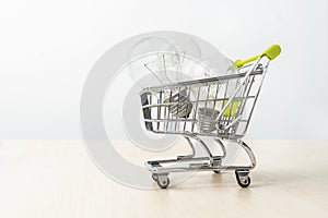 Three light bulb on the shopping cart