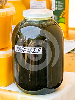 Three liter glass jar with buckwheat honey