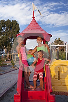 Three little girls at the playground