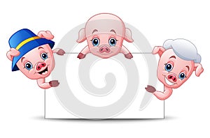 Three little pigs cartoon with blank sign