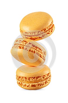 Three macarons isolated on white background. Sweet levitated French sandwich cookies
