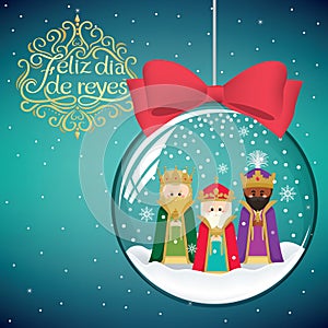 Three magic kings in Christmas decoration ball photo