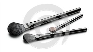 Three makeup brushes are shown on a white background