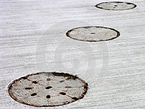 Three manholes 2