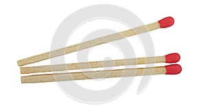 Three matches isolated on white background with light shadow.