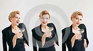 Three mature stylish elegant women twins in tuxedo with glass of sparkling wine.