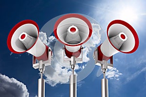 Three megaphones on sky background. Isolated 3D illustration