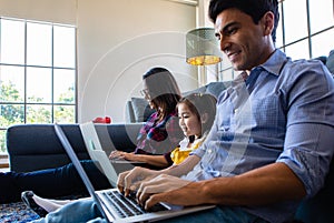 Three member of family working together