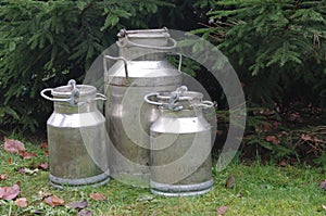 Three metal cans