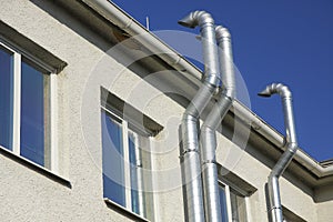 Three metal chimneys