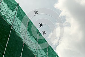 Three military jets on the sky