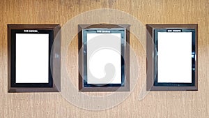 Three Mock up poster frames on Cinema wall