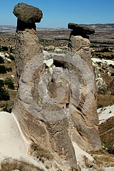 Three mountains (also called Fairy Chimneys or Three Beauties) near the town of Urgup in Cappadocia, Turkey