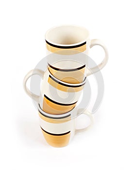 Three mugs isolated on white background