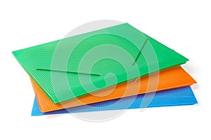 Three multi-colored folders angle view isolated with clipping path