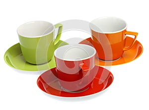Three multi-coloured cups on a white background