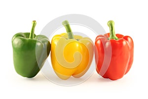 Three multi-coloured pepper