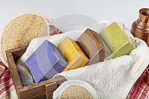 Three natural handmade soap. Beautiful soaps made of lavender, coffee, saffron, olive