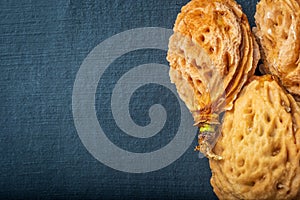 Three nectarine fruit seed stones overhead closeup