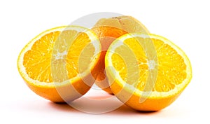 Three nicely colored oranges on a white background - front and back cut in half