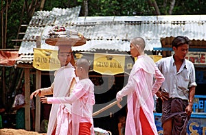 Three nuns walking in Pakokku