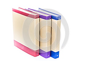 Three office binders lined up in a row