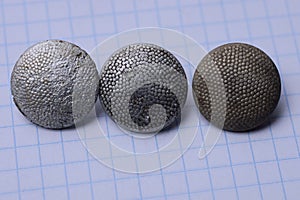 Three old gray military aluminum buttons