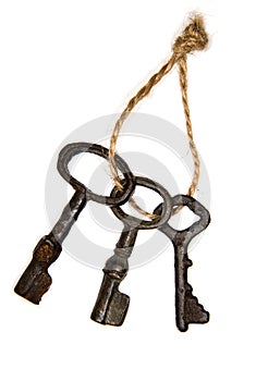 Three old keys from the door tied with rope